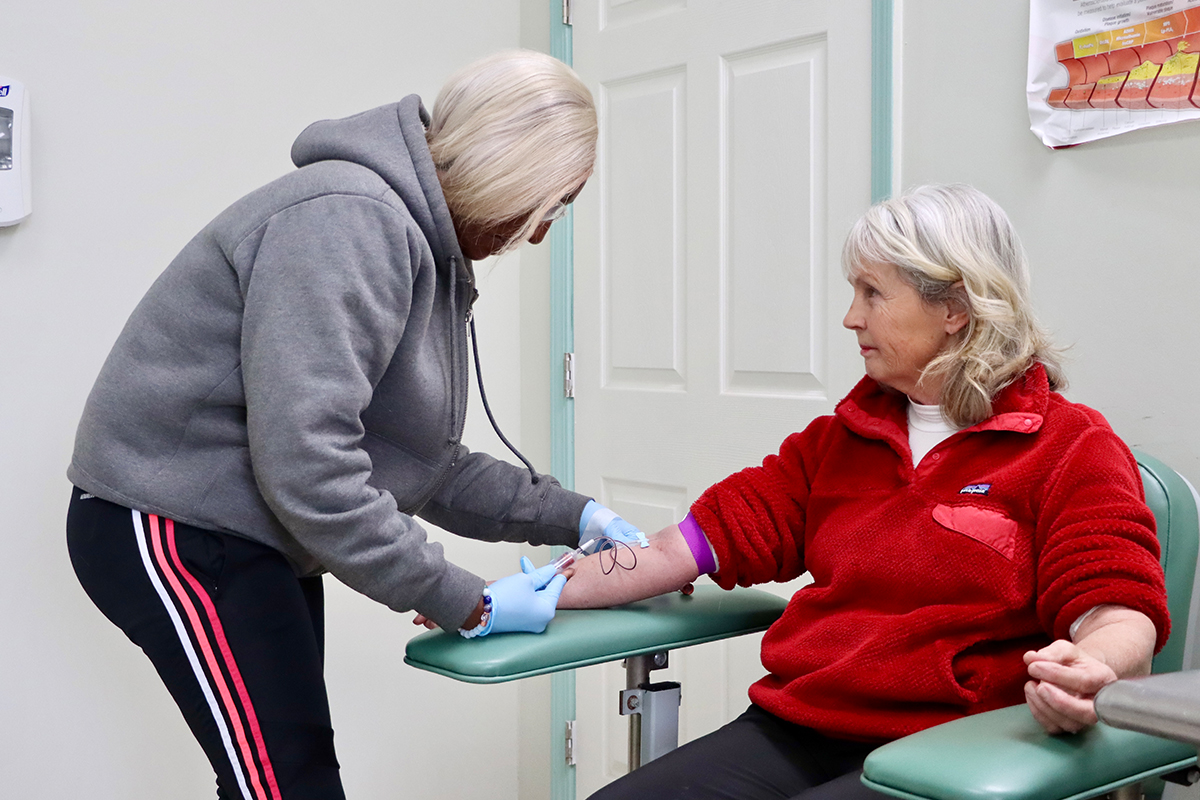 Woman giving blood