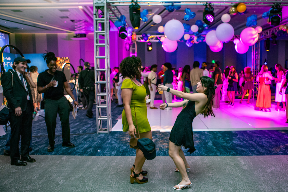 students dancing at crossover party
