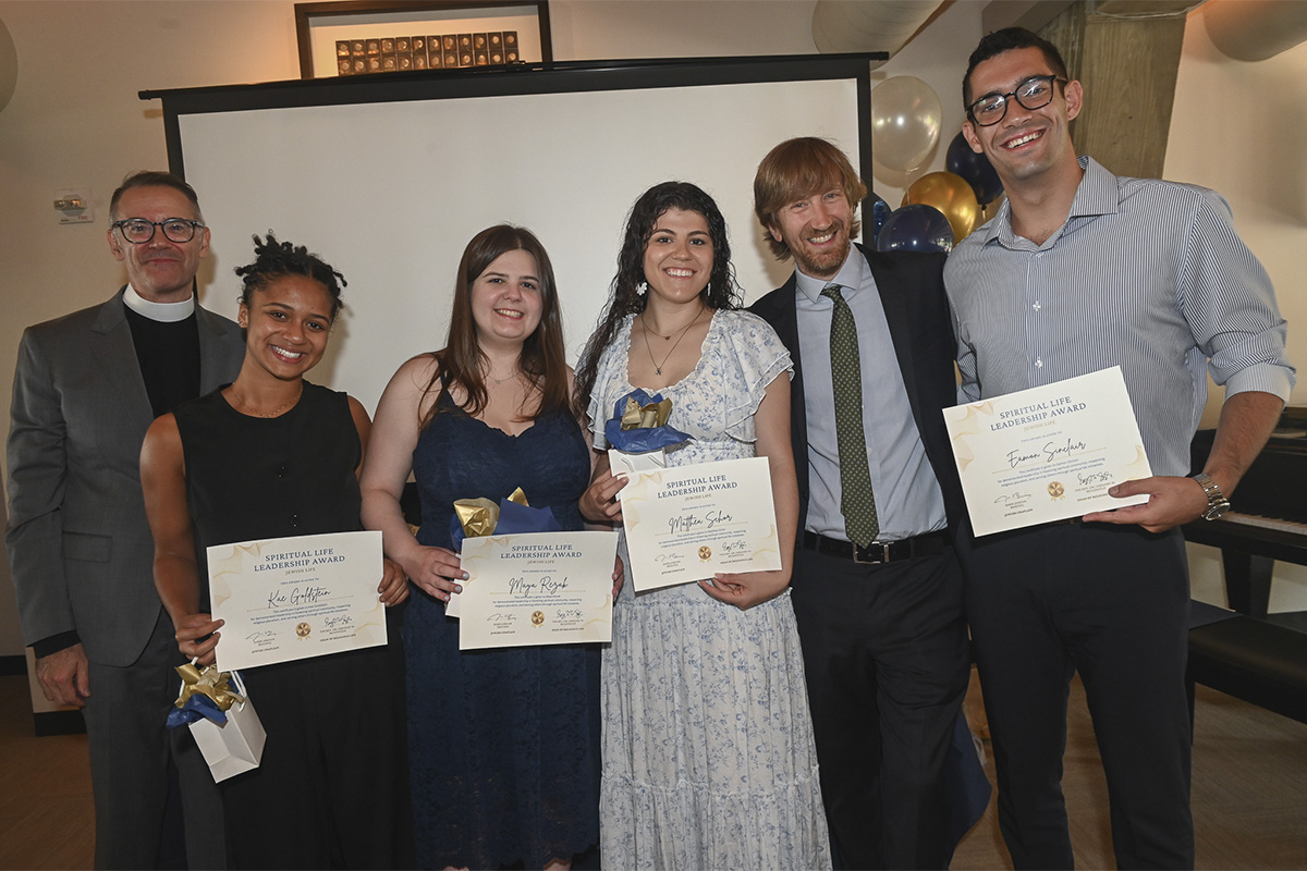 group of college students and adult advisors