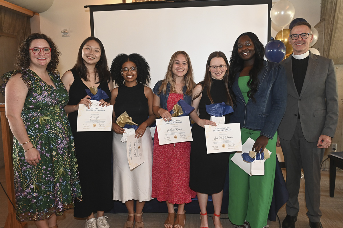 group of college students and adult advisors