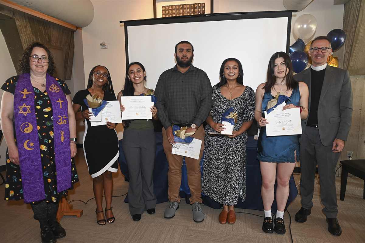 group of college students and adult advisors