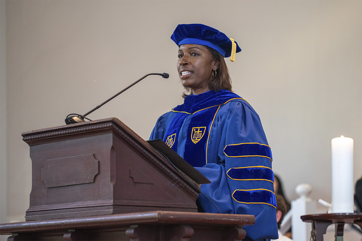 Oxford College dean Badia Ahad at podium in Commencement regalia