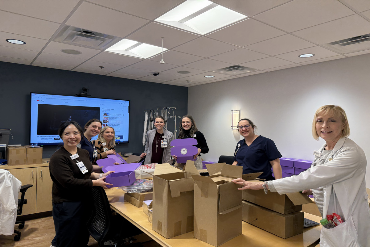 Pauline Chen and her team packing Code Lavender boxes