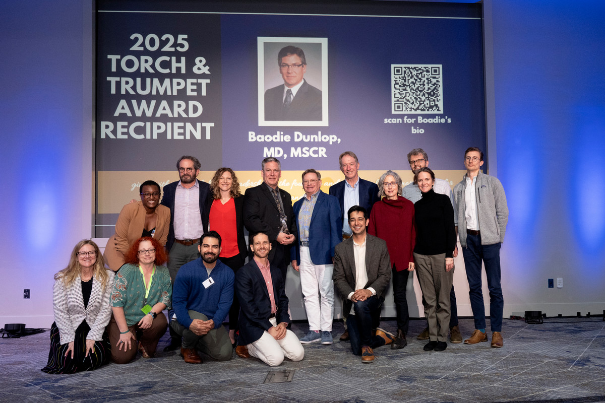 Boadie Dunlop (standing, fourth from the left) and George Grant (standing, fifth of the left) are surrounded by members of the Emory Center for Psychedelics and Spirituality team
