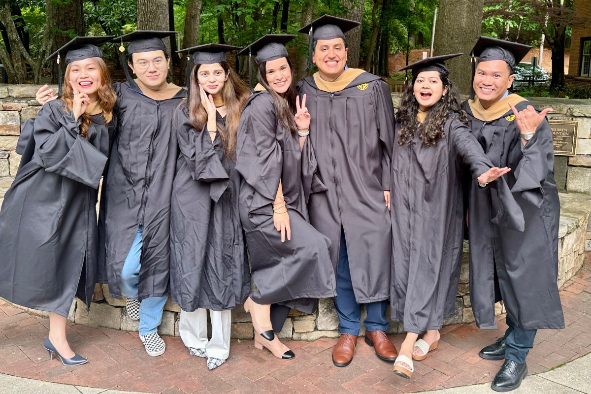 students in graduation regalia 