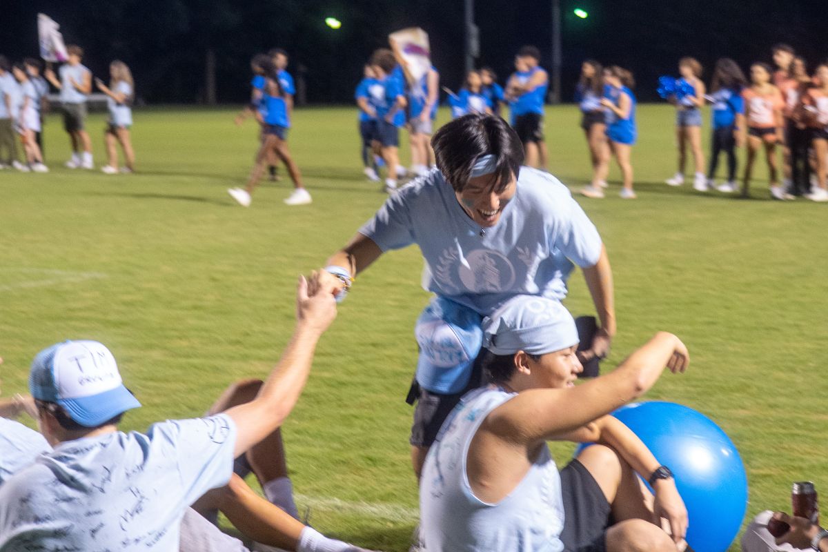 male students playing a game in the Oxford Olympics