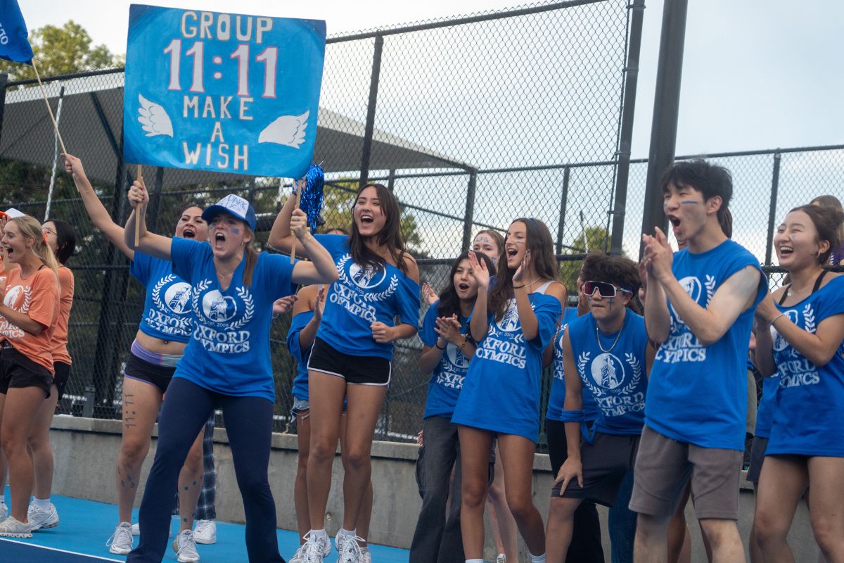 students in blue t-shirts at the Oxford Olympics 