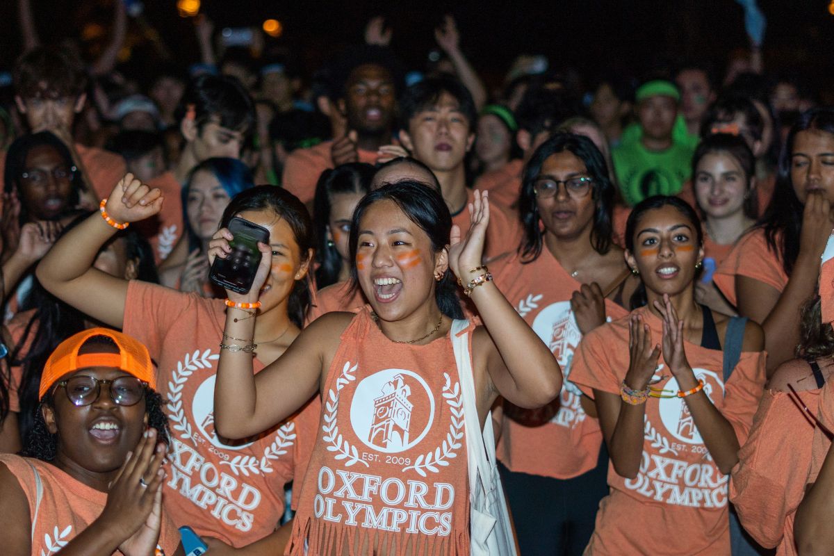 students in orange t-shirts at the Oxford Olympics 