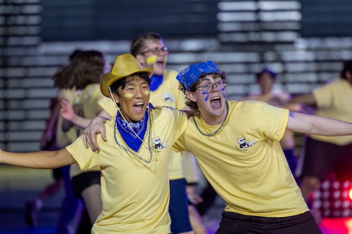 two male students dancing during Songfest