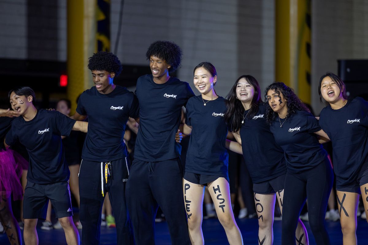 group of students dancing during songfest 
