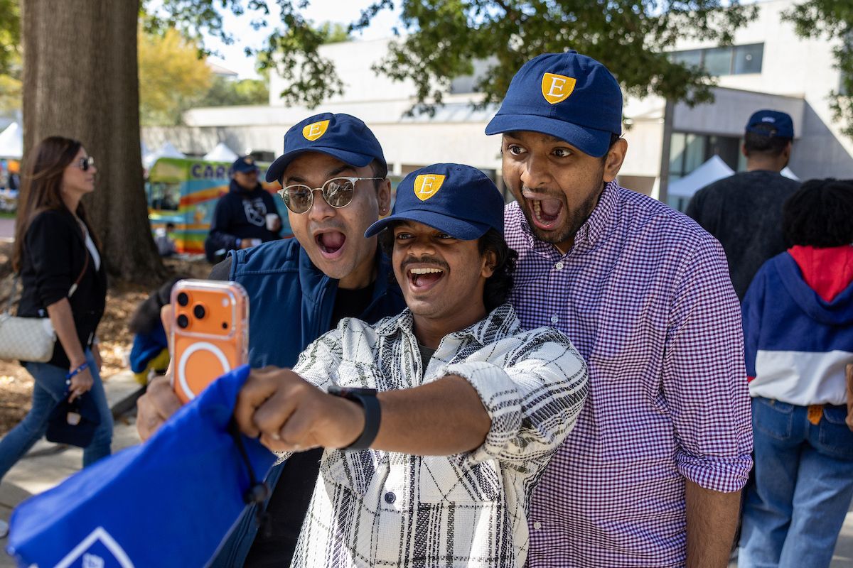 group of men taking a photo