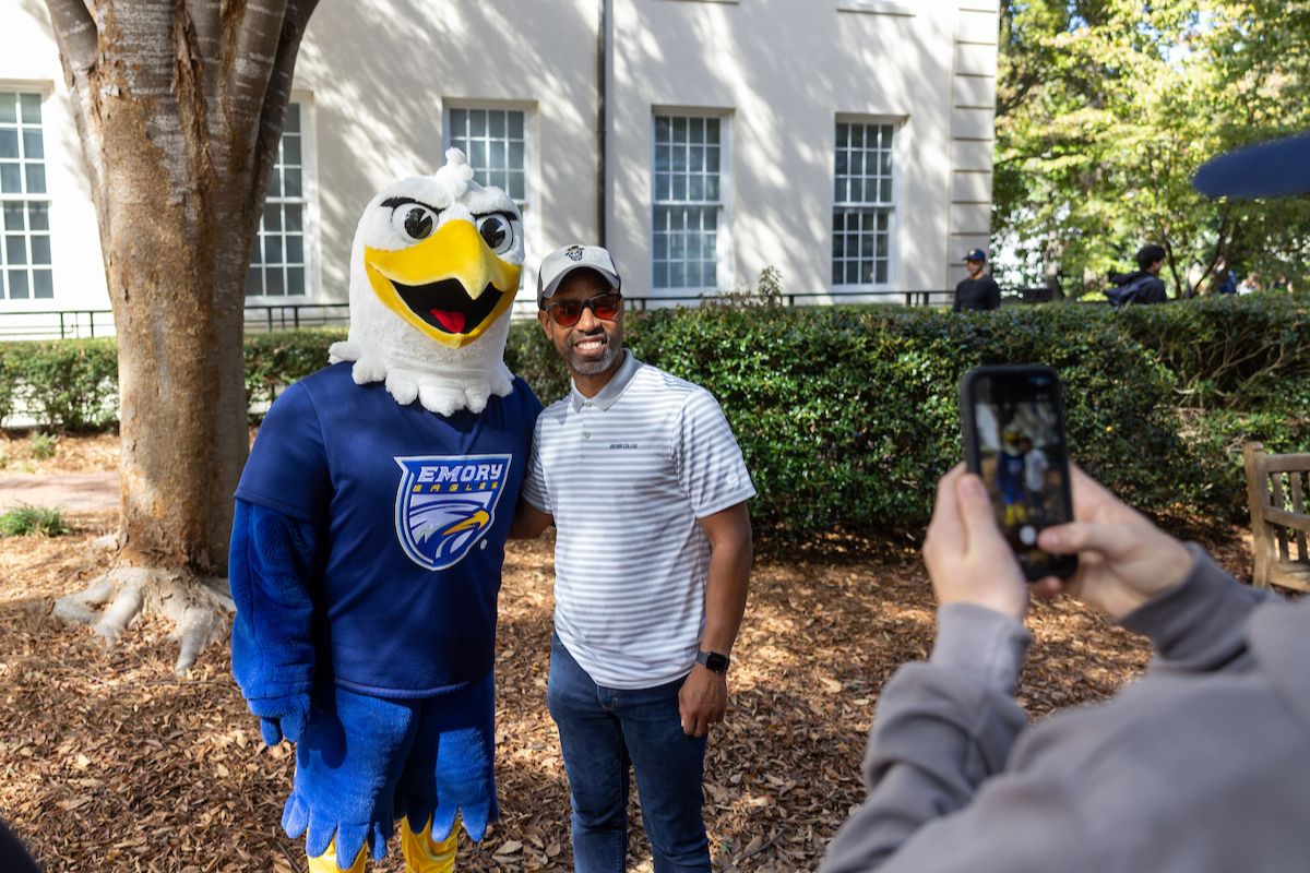 man poses for a photo with Swoop