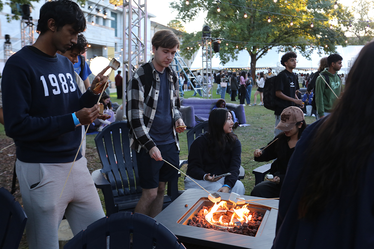 students roasting marshmallows