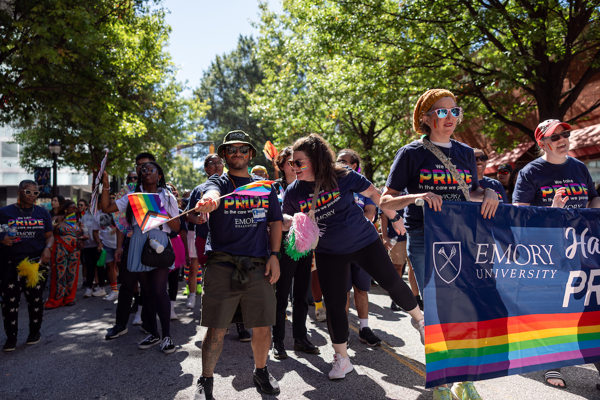 group walking with banner