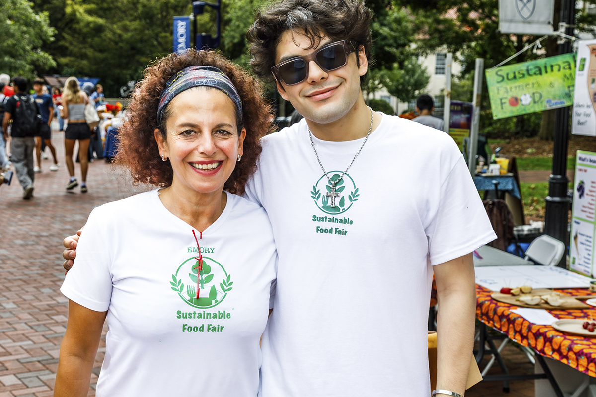woman and man outside at a food market 