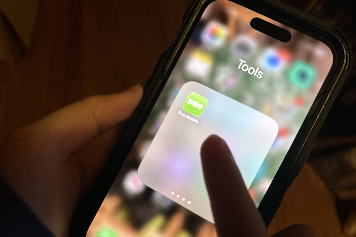 Image of a person hovering over the duo app