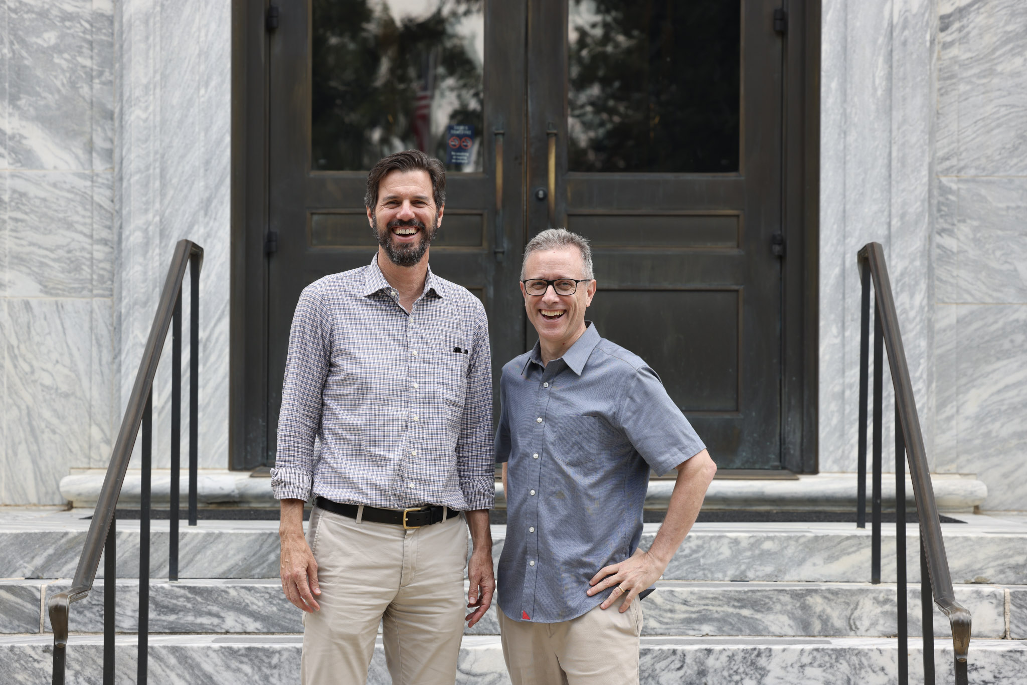 two of the lead PIs stand together