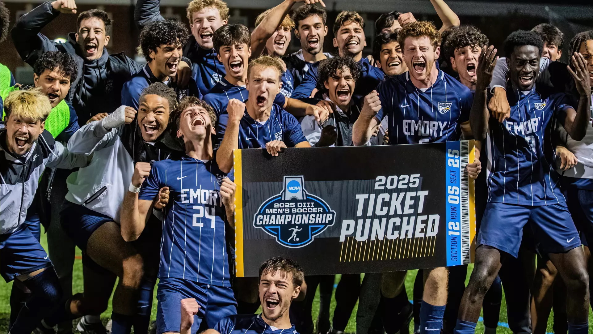 Men's soccer team with final four banner