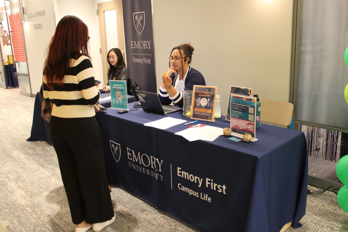 student at information table