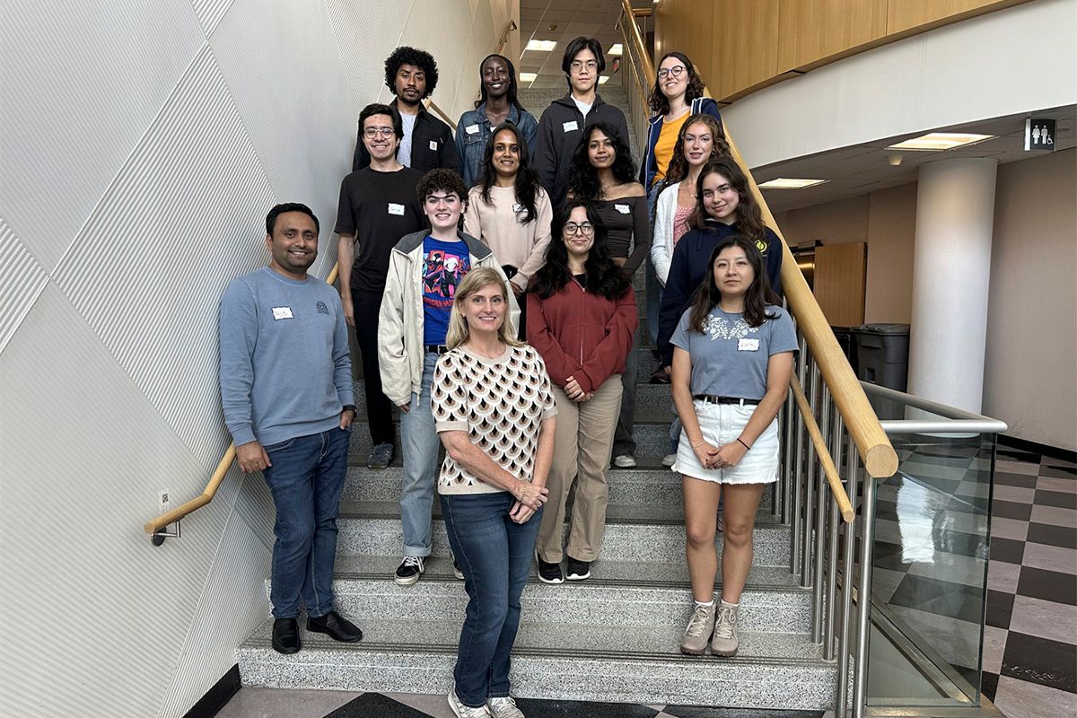students standing on stairs
