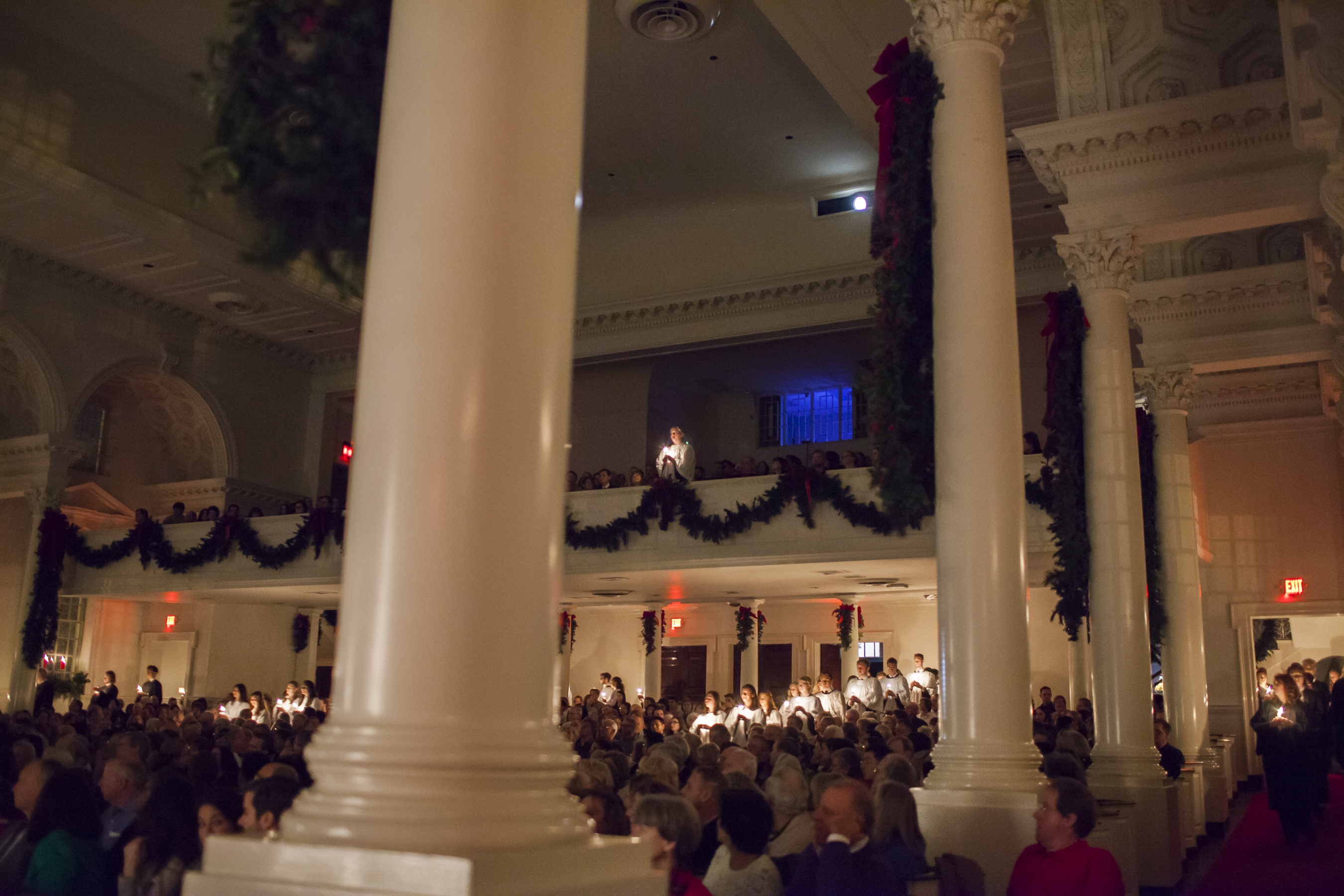 Lessons and Carols singers processing with candles