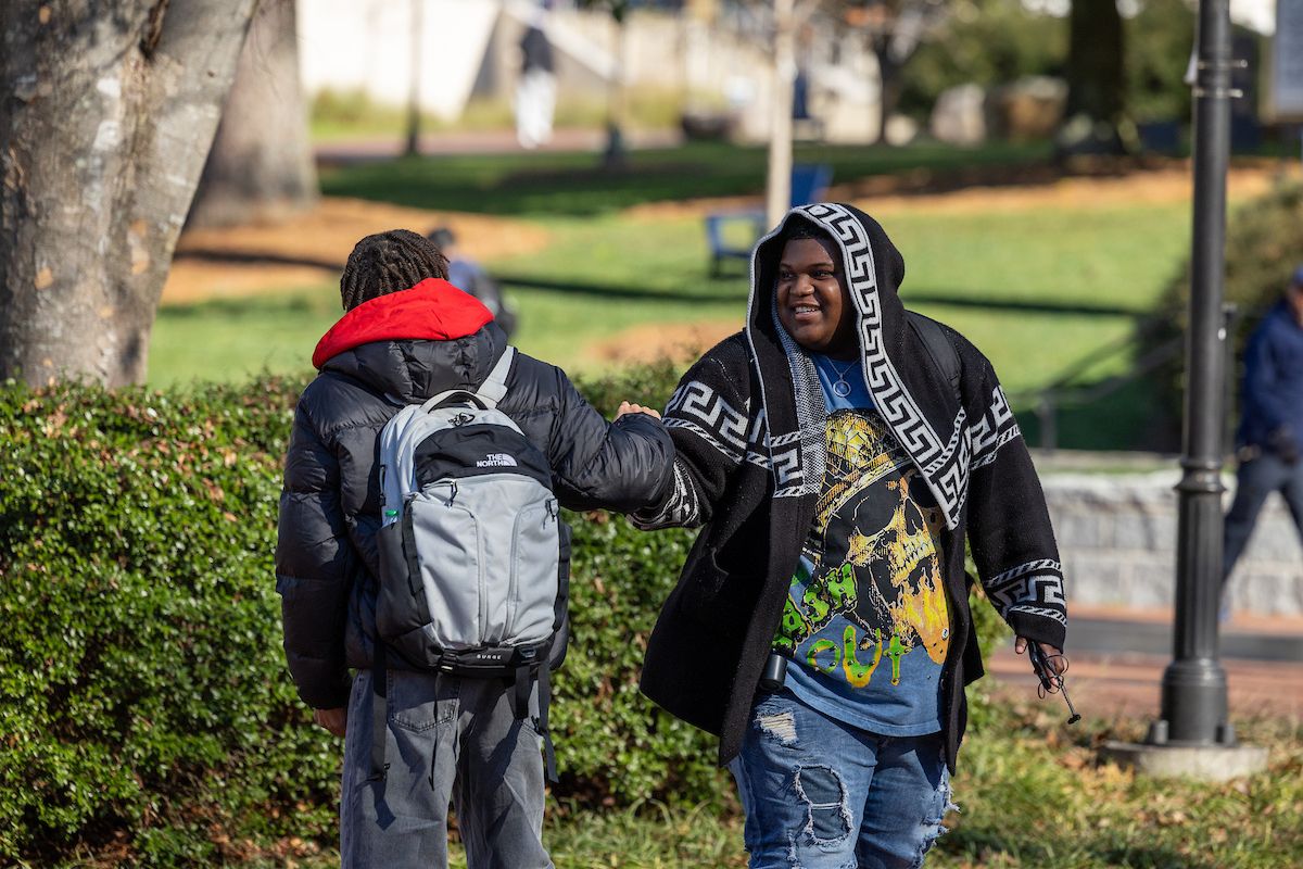 students greeting eachother 