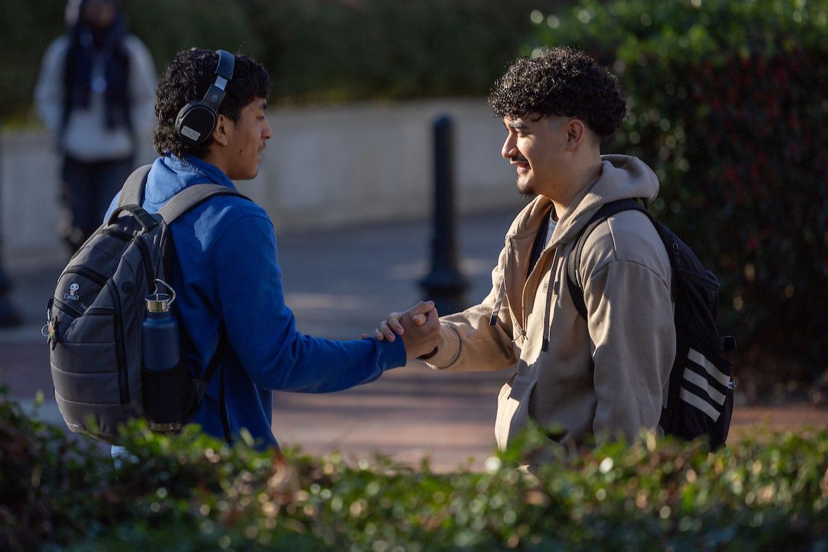 students greeting eacher 