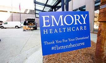 Sign pointing to donation drop-off site