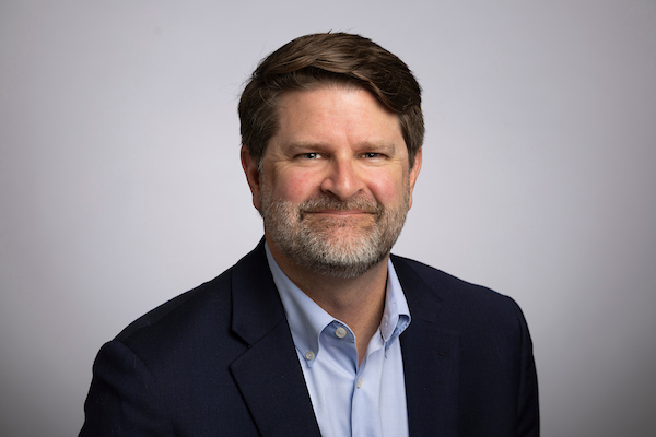 Headshot of James Raper
