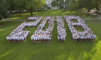The Class of 2018 pose to spell out "2018"