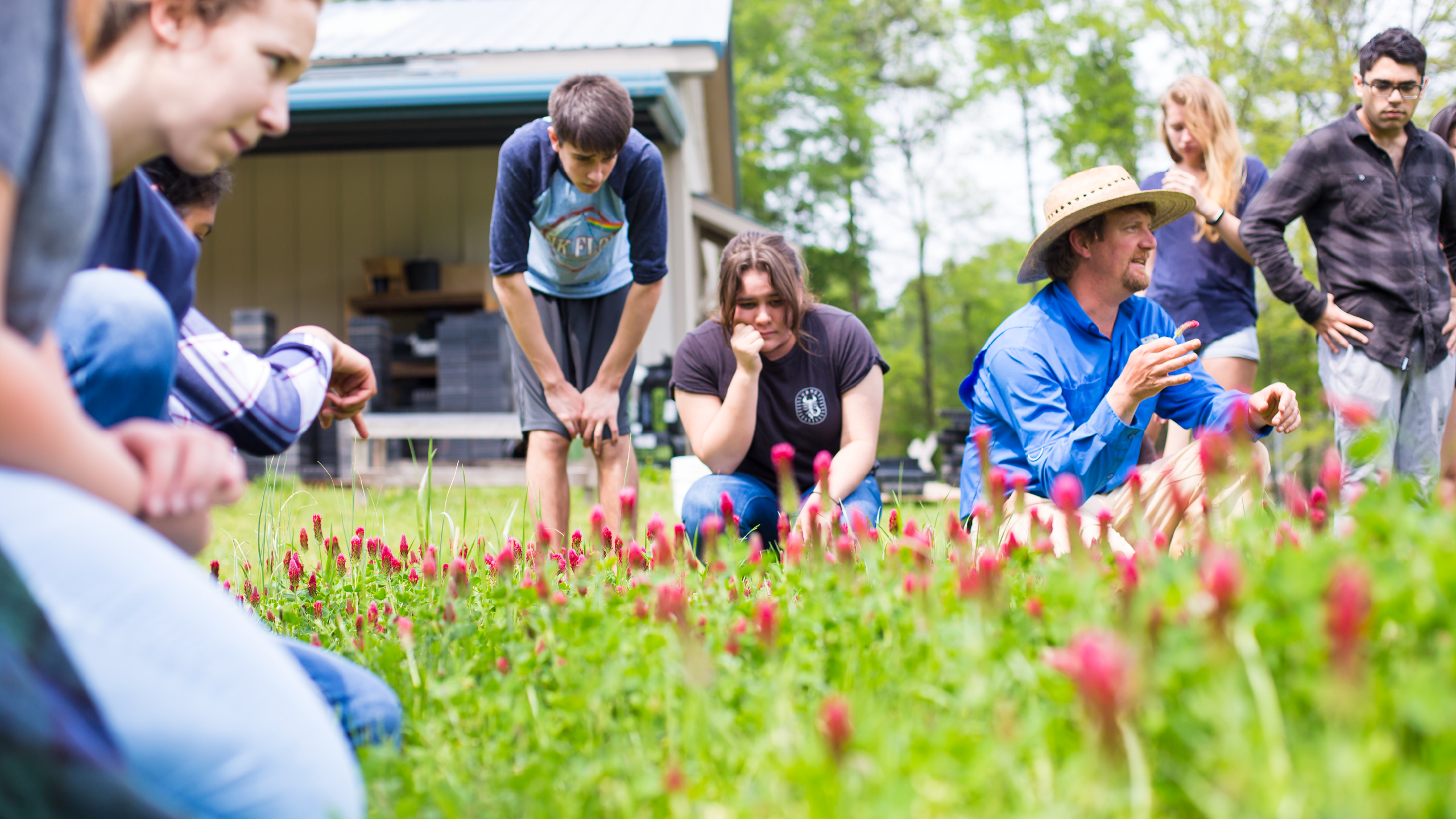 Farmer Daniel Parson and students on the farm
