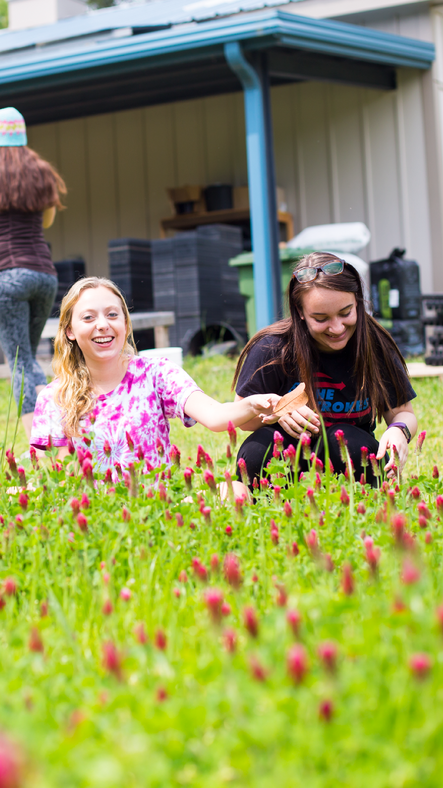 Two women students in a field