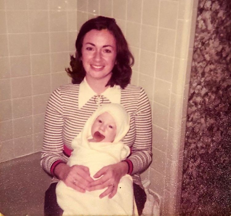 Photo of Andy Lipman as a baby in his mother's lap and, above, using a percussive vest to break up mucus in his lungs.