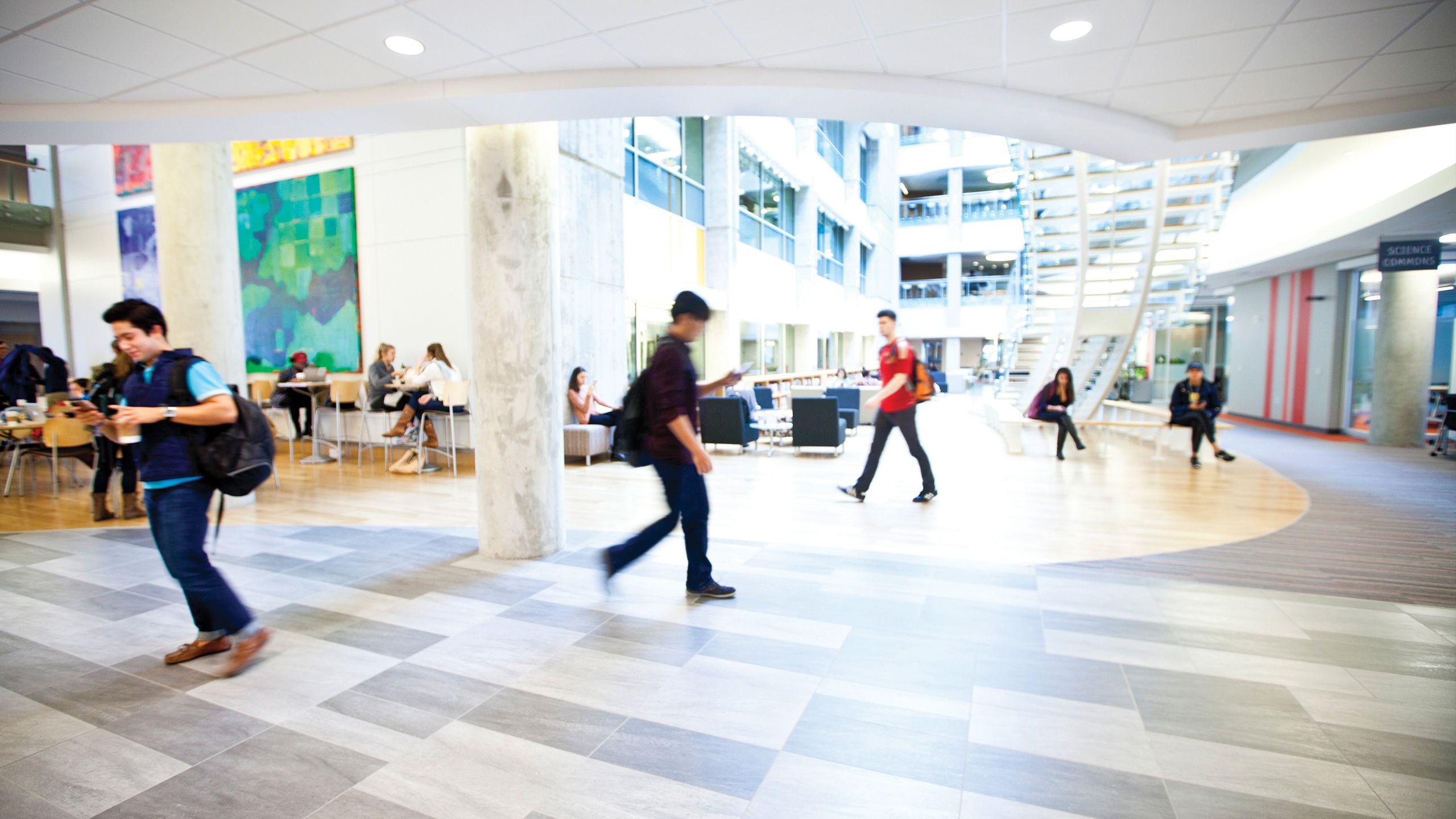 Interior of lobby at Emory students walking to classes